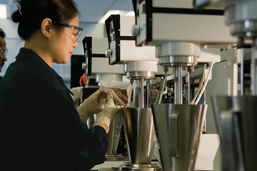 Photo of a drilling fluids engineer in the lab.