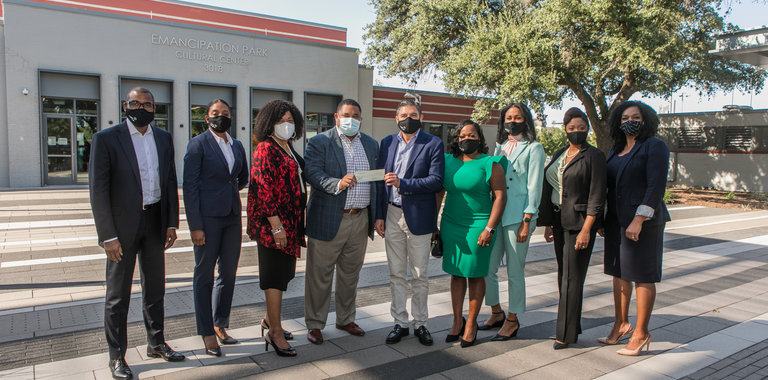 people standing with masks on